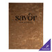 A brown customizable menu cover with black text on a table.