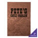 A bronze metallic menu cover with the words "Pete's Chill Parlor" in black.