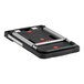 A black and silver plastic platform with red buttons.