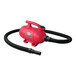 A pink XPOWER pet vacuum with a black hose.