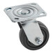 A black metal Avantco heavy-duty plate caster wheel.