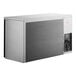 A rectangular black Perlick back bar refrigerator with a black door.