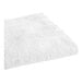 A folded white 1888 Mills Naked Terry bath mat.