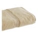 A beige 1888 Mills Magnificence Pima Cotton bath sheet.