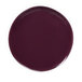 A purple plate with a white reactive glaze on a white background.