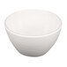 An Elite Global Solutions Maya cream melamine bowl with a curved edge on a white background.