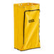 A yellow Lavex Premium janitor cart bag with black text.