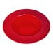 A red bowl with a white center and a circular design.