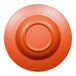 An orange melamine bowl with a red reactive glaze and a circle in the middle.
