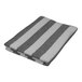 A folded 1888 Mills Fibertone grey and white striped pool towel.