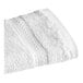 A close up of a 1888 Mills Pure Terry white washcloth.