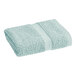 A close-up of a light blue 1888 Mills Fibertone hand towel.