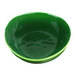 A green bowl with an irregular surface on a white background.