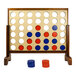 A Yard Games customizable giant four-in-a-row game board with blue and red circles and chips.