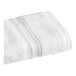 A folded white 1888 Mills Sweet South hand towel with a white stripe.