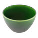 A green Elite Global Solutions melamine bowl with a white stripe.