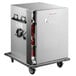 A Metro TC90BB heated holding cabinet on a cart with a door.