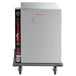 A large stainless steel Metro heated holding cabinet on a cart.