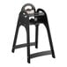 A black Koala Kare child's high chair with a handle.