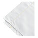 A close-up of a white cloth with yellow stitching.