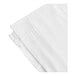 A close-up of a white Magnificence flat sheet with tone on tone stripes.