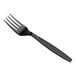 A black plastic fork with a black handle.