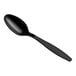 A black plastic spoon with a handle.