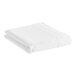 A folded white 1888 Mills Oasis Queen Size flat sheet.