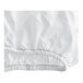 A close up of a white 1888 Mills Dependability Twin Size fitted sheet with a crease.