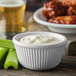 A white Carlisle fluted ramekin filled with a white substance.