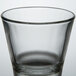 A close up of a clear Libbey shot glass.