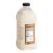 A jug of Lotus Plant Energy Original Vanilla Oat Cream Concentrate with a label.