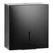 A black wall mounted Bobrick Fino toilet paper dispenser.