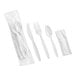 A set of white heavy weight plastic cutlery including a knife, fork, spoon, and a napkin, with an additional wrapped pack.