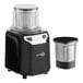 A commercial spice grinder with a black base and two stainless steel bowls.