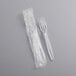 A plastic wrapped Choice Clear Heavy Weight plastic fork.