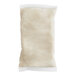 A white plastic bag of Minor's Vegan Alfredo Sauce.