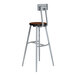 A National Public Seating lab stool with a wood seat.