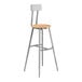 A National Public Seating Titan lab stool with a wooden seat and backrest and metal legs.