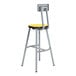 A grey National Public Seating lab stool with a marigold seat and backrest.