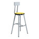 A National Public Seating Titan lab stool with a yellow seat and gray legs.