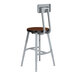 A National Public Seating Titan lab stool with a Montana walnut high-pressure laminate seat and backrest made of steel and MDF.