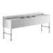 A stainless steel Regency underbar sink with three bowls and two drainboards.