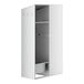 A white metal cabinet with a door and a shelf with a mop sink inside.