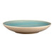 A blue and white RAK Porcelain deep coupe plate with a turquoise design.