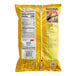 A yellow bag of Tostitos Thick & Hearty Rounds on a white background.