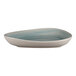 A RAK Porcelain deep organic plate with a white background and blue spots.