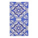 A blue and white Moroccan Nights paper guest towel on a table.