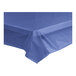 A navy blue plastic tablecloth unrolled on a table.