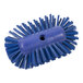 A close-up of a Carlisle blue circular brush with bristles.